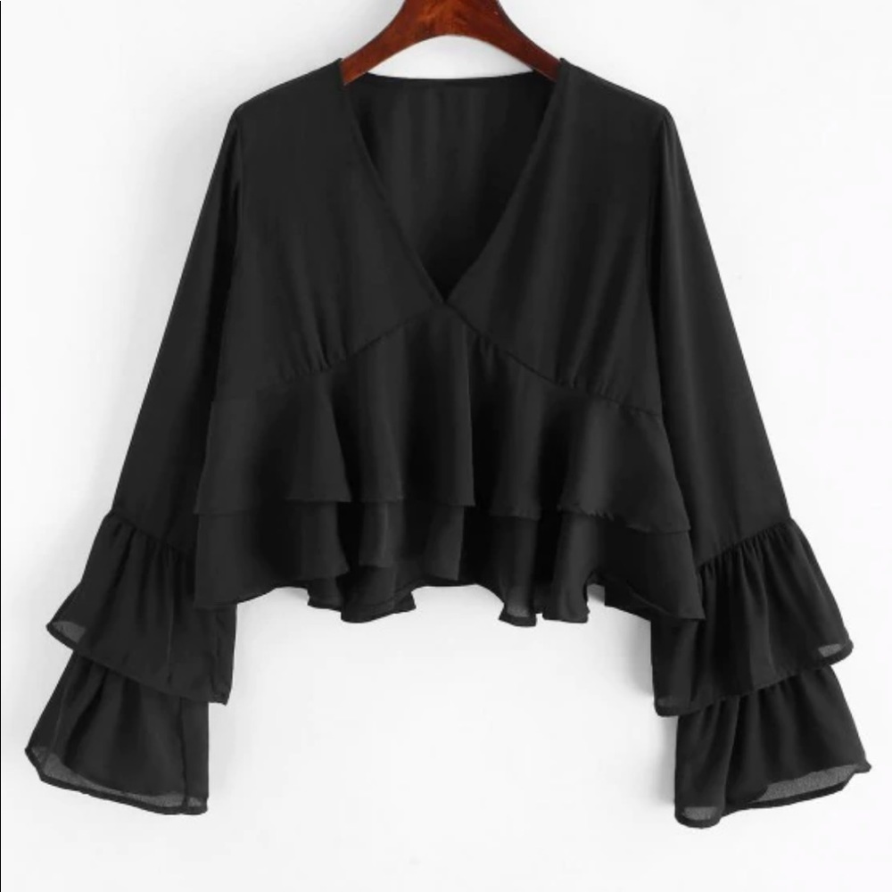 black blouse with ruffles